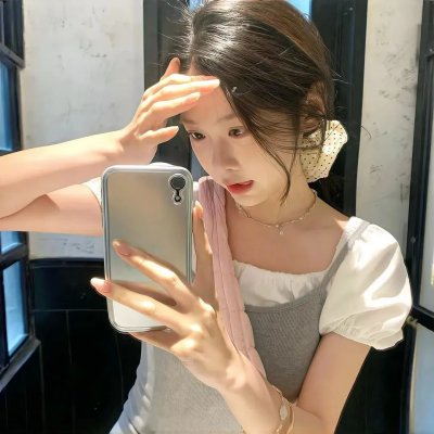照片的她